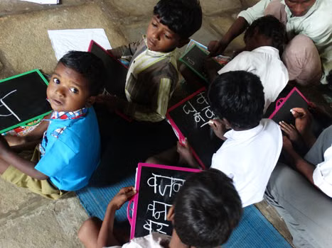 Children learning together in a classroom